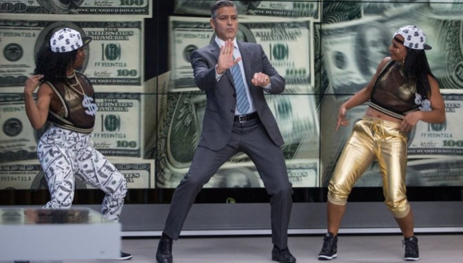George Clooney (center) stars as Lee Gates in TriStar Pictures' MONEY MONSTER.